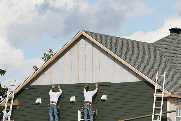 Professional Siding Installation technician working in Julian, PA